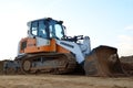 Crawler Loader Liebherr LR 636 Litronic at construction site.