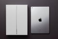 Minsk, Belarus- December 10, 2021: Apple Ipad 9 generation 10,2 inches 2021 with package box on black backdrop Royalty Free Stock Photo