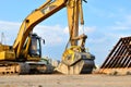 Excavator CATERPILLAR 324DL with crusher bucket MB BF80.3 S4 for crushing concrete at construction site