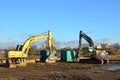 Excavator New Holland E215B with crusher bucket MB BF80.3 S4 for crushing concrete and Excavator VOLVO