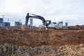 Excavator Hidromek HMK 220 LC working at construction site. Construction machinery for excavation,