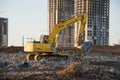 Excavator NEW HOLLAND with jaw crusher bucket for crushes concrete and recycle material. MB Crusher