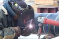 welder at work. Close up photo of factory worker