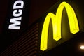 MINSK, BELARUS - January 8, 2018: McDonald`s logo at night. McDonald`s is the world`s largest chain of hamburger fast food restaur