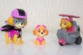 Minsk, Belarus - January 9, 2022: Paw patrol team. Different miniatures of hero Skye with pink helicopter