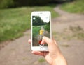 Minsk, Belarus - July 28, 2016 : Apple iPhone6s held in one hand showing its screen with Pokemon Go application