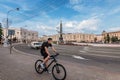 Bicyclist Riding Bicycle on Victory Square