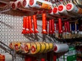 Minsk, Belarus - July 06, 2020: Brushes and rollers for paint work of various manufacturers on store shelves, for sale. for