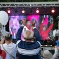 Elderly man applauds at opposition rally in Minsk on July 30, 2020. Belarusian politic opposition. Presidential Elections in Belar