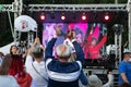 Elderly man applauds at opposition rally in Minsk on July 30, 2020. Belarusian politic opposition. Presidential Elections in Belar