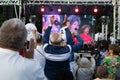Elderly man applauds at opposition rally in Minsk on July 30, 2020. Belarusian politic opposition. Presidential Elections in Belar