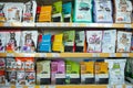 MINSK, BELARUS - June 11, 2020: Food department for pets. Shelving with various types of food for pets inside a supermarket.