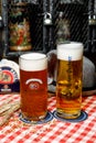 Minsk, Belarus - June 17, 2020: a glass of Hacker-Pschorr, German beer brewed since 1417.