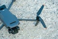 Minsk, Belarus, June 1, 2022: New drone DJI mavic 3 is standing on a concrete surface. Parts of a new modern quadcopter in close-