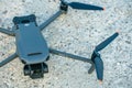 Minsk, Belarus, June 1, 2022: New drone DJI mavic 3 is standing on a concrete surface. Parts of a new modern quadcopter in close-