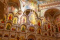 Minsk, Belarus - June, 2019. Sanctuary with lots of mural paintings of images of saints in the Church of all saints Royalty Free Stock Photo