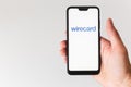 Minsk, Belarus- June 18 2020: smartphone with wirecard logo on the screen. hand touching the screen Royalty Free Stock Photo