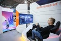 Minsk. Belarus - 05.31.2021 - Man plays the video game at the Tibo exhibition in Minsk, Belarus.