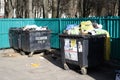 Minsk. Belarus. March 9, 2019. outdoors. tank with a lot of trash. there are birds. not sorted