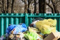 Minsk. Belarus. March 9, 2019. outdoors. tank with a lot of trash. there are birds. not sorted