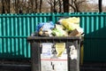 Minsk. Belarus. March 9, 2019. outdoors. tank with a lot of trash. there are birds. not sorted