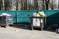 Minsk. Belarus. March 9, 2019. outdoors. tank with a lot of trash. there are birds. not sorted