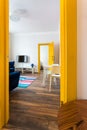 MINSK, BELARUS - March, 2019: retro bright interior of hipster flat apartments with yellow door Royalty Free Stock Photo