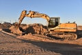 Excavator CASE 1188 working at construction site. Construction machinery for excavating, loading,