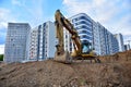 Excavator CATERPILLAR 325C LN on earthwork at constrruction site