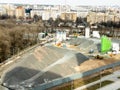 Minsk, Belarus - May 2022: top view of a concrete plant near the construction of high-rise buildings