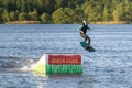 Wakeboarding on the water. Entertainment on a day off in the park on the water. Water jumping Royalty Free Stock Photo