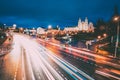 Minsk, Belarus. Night Traffic On Illuminated Street And Cathedral Of Holy Spirit In Minsk. Famous And Main Orthodox Royalty Free Stock Photo