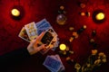 Minsk, Belarus - November 2021: the fortuneteller holds the Death tarot card in his hand