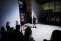 Three girls posing for pictures at Fashion Week on Kids Day