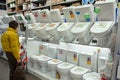 MINSK, BELARUS - November 23, 2019: Toilet bowls are sold in a hardware store. The buyer chooses a toilet in a plumbing store.