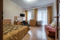 MINSK, BELARUS - OCTOBER 2020: Interior of the bedroom with wheelchair in apartments or hotel for people with disabilities,