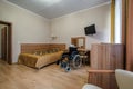 MINSK, BELARUS - OCTOBER 2020: Interior of the bedroom with wheelchair in apartments or hotel for people with disabilities,