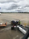 Loading passengers on a airliner. The view from the passenger compartment through the porthole