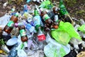 People throw away plastic bottles, bags and food waste, leave trash on the street after themselves Royalty Free Stock Photo