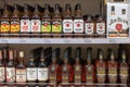Minsk, Belarus - September 22, 2020: Bottles of North American whiskey on the shelves in the store. The brands: Jim Beam, Black