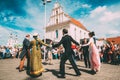 Minsk, Belarus. Couple of people dressed in clothes of the 19th century dancing Polonaise at the celebration of the Day