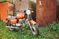 Vintage Red Motorcycle Generic Motorbike In Countryside Royalty Free Stock Photo