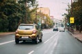 Minsk, Belarus. Renault Sandero Car Of Mustard Colour Moving On Kuybysheva Street Royalty Free Stock Photo