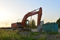 Tracked excavator Hitachi ZAXIS 240LC working at a construction site