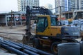 Volvo EW160B wheeled excavator at a construction site