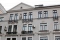 Minsk, Republic of Belarus - june 02, 2022: Facade and windows of old tall building