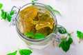 Mint candies in a glass jar.