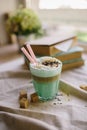 Mint coffee with with cream and colorful decoration. Milk shake, cocktaill, frappuccino. Unicorn coffee, unicorn food. Royalty Free Stock Photo