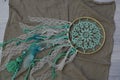 Mint in dream catcher color on natural linen fabric, hand made. Royalty Free Stock Photo