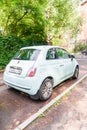 Mint Fiat 500 three door hatchback parked on the street in the city. Rear side view of small car Royalty Free Stock Photo